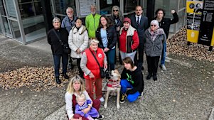 Members of Heidelberg West community outside the Olympic Leisure Centre rallying against the closure of the centre’s pool.