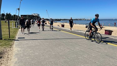 Beachgoers begun flocking to St Kilda beach from early Tuesday.