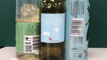 Public health advocates say alcohol producers are using label design to obscure the DrinkWise warning. 