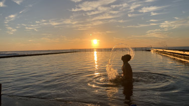 Sam, an early swimmer at Austinmer beach in Wollongong. Photo taken at sunrise with the new Apple iPhone Xs Max.