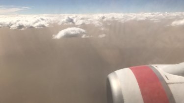 The dust storm over Canberra from a Virgin Australia flight, which had to abort its first landing attempt on Tuesday afternoon because of wind. 