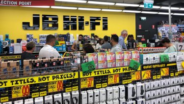 jb fi hi sales australia despite guidance cuts soaring quarter jump third huge seen shoppers offices rush surge kit their