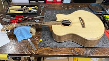 Tim strung this acoustic guitar for a friend. 