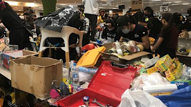 Inside Polytechnic University supplies are piled on tables like a protester supermarket.