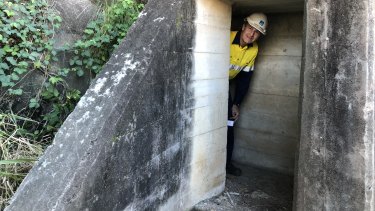 Lord mayor Graham Quirk in one of the air-raid shelters uncovered at the Howard Smith Wharves development.
