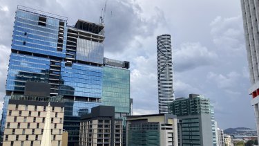 Dark clouds linger over Brisbane on Friday morning.