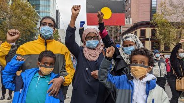 Ezi Osman at Melbourne's Black Lives Matter protest with her family. 