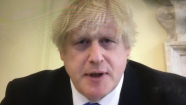British Prime Minister Boris Johnson speaks to a parliamentary committee by videolink.