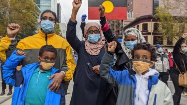 Ezi Osman at Melbourne's Black Lives Matter protest with her family. 