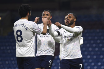 Raheem Sterling, right, celebrates after combining with Ilkay Gundogan for a City goal.