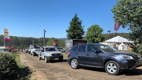 Festivalgoers pack up their tents after Falls Festival in Lorne was cancelled due to extreme weather conditions. 