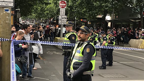 Police block off Bourke Street.