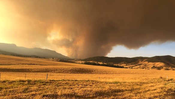 Fire approaching the Sheather family farm.