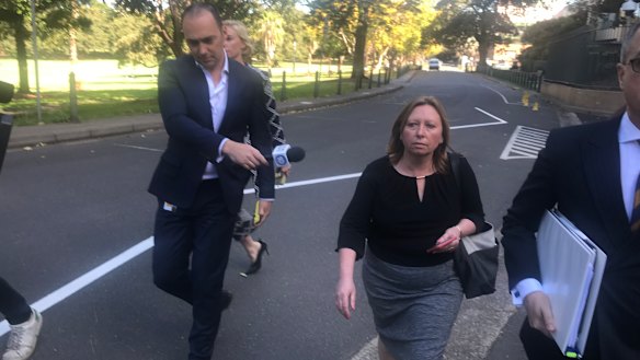 Rebecca Cartwright collecting a hard drive from State Parliament on Wednesday.