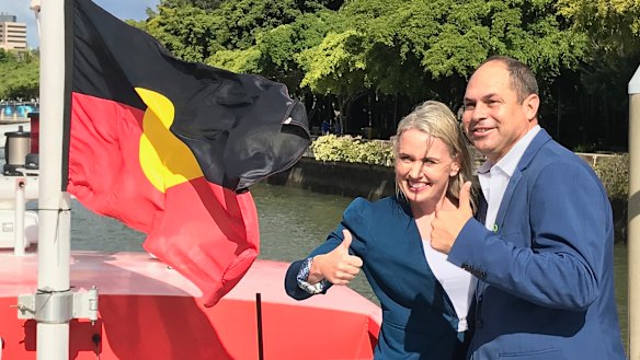 Quandamooka people's business chief executive Cameron Costello with Tourism Minister Kate Jones as Quandamooka whalewatching tours from North Stradbroke Island were launched earlier this year.