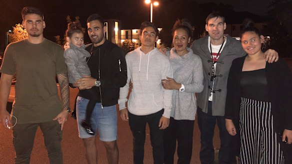 Tyrone May with his parents and siblings.