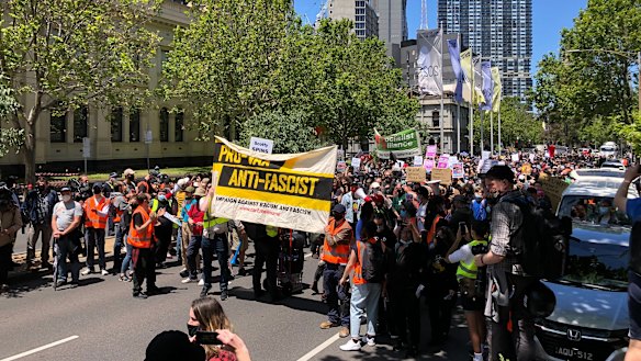 The ‘pro-vax, anti-fascist’ rally in Melbourne moves down Lygon Street on Saturday afternoon.