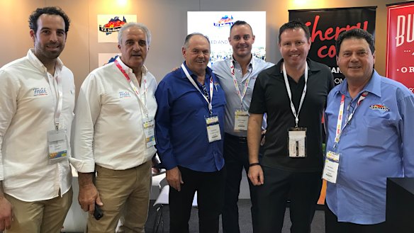 Andrew Broad pictured with Australian fruit producers at a conference in Hong Kong.
