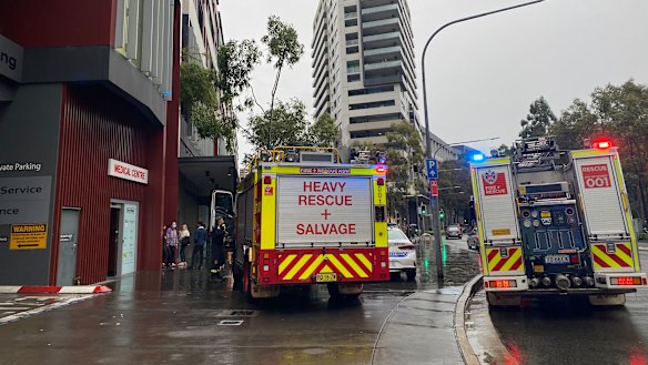 At least three people are trapped in a lift at East Village shopping centre after a power outage. 