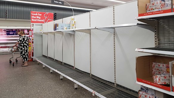 Empty toilet paper shelves at New Farm Coles on Monday.