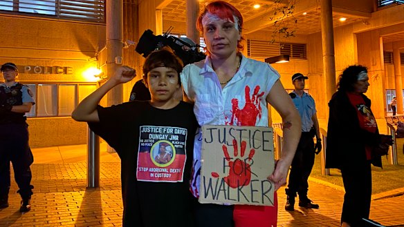 Activist Elizabeth Jarrett (right) at the protests in Sydney's CBD.