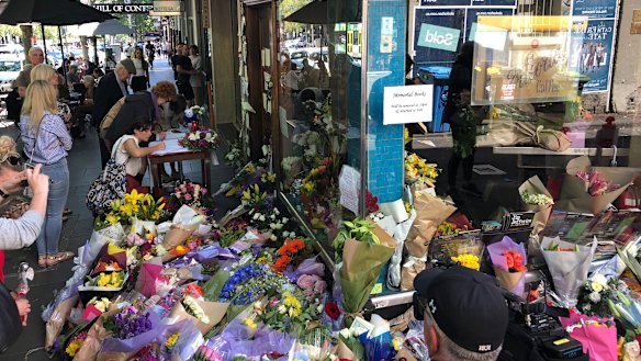 Flowers outside Pellegrini's Espresso Bar on Bourke Street, whose proprietor Sisto Malaspina was killed by Shire Ali.