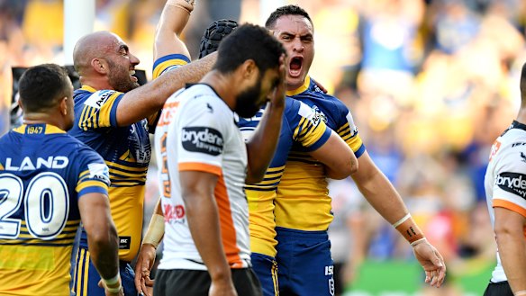 Tough day out: The debut of Bankwest Stadium was an afternoon to forget for Robert Jennings and Wests Tigers.