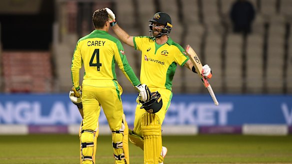 Alex Carey and Glenn Maxwell celebrate Carey's maiden ODI ton at Old Trafford.