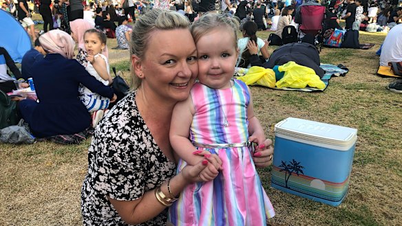 Erin Whitbread and two-year-old daughter Annabelle at Yarra Park. 
