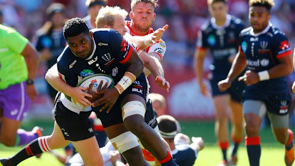 On the charge: The Rebels' Isi Naisarani in action against the Lions.