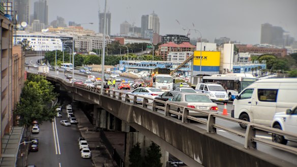 A serious motorcycle crash on the Western Distributor closed three city-bound lanes.