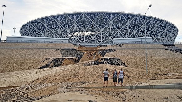 A huge crack has formed in an embankment outside Volgograd Arena after heavy rain triggered a landslide.