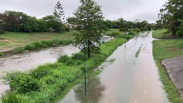 Local flooding at Kedron Brook in the Brisbane suburb of Lutwyche on Saturday.