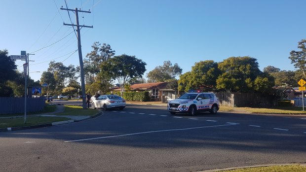 Residents woke up to hearing 'shots' and screams on Goman Street at Sunnybank. Emergency services were at the scene, treating patients and closing the road.