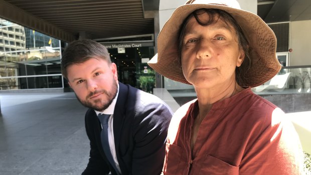Bimblebox Nature Refuge co-owner Paola Cassoni with Environmental Defenders Office chief executive David Morris outside Queensland's Law Courts.