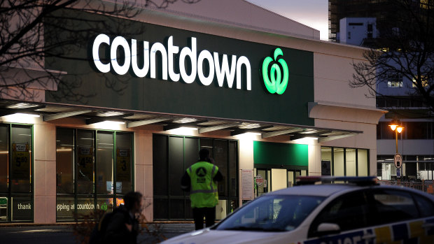 A police car is observed blocking an entrance to the Dunedin Central Countdown in Dunedin, New Zealand. 