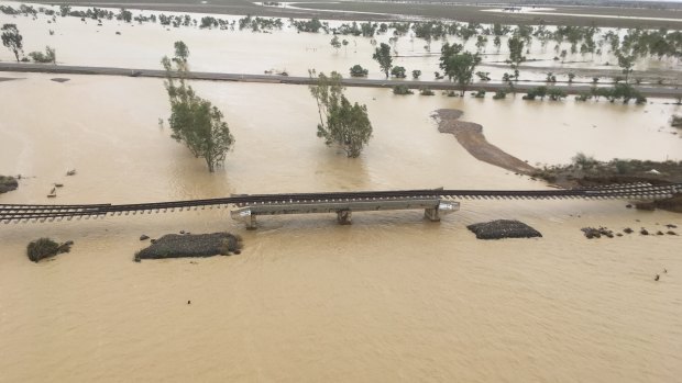 Aerial view of the Mount Isa rail line east of Julia Creek, taken earlier this month as the flood peaked in the area.