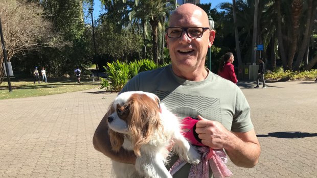 Todd Simpson and his King Charles spaniel Daisy will be able to travel on Brisbane's CityCats before Christmas.