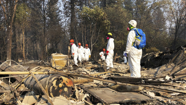 Search and rescue teams comb the ruins of Paradise, California.