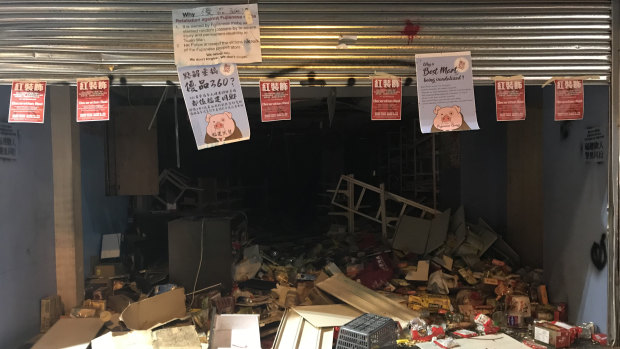 Protesters left a note explaining why this Chinese store on Nathan Road, Hong Kong, was ransacked.