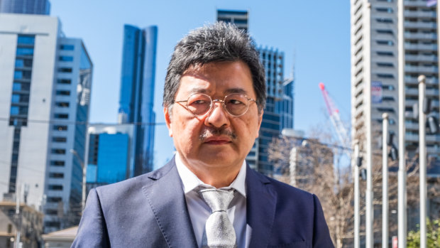 One of the fresh photos taken of elusive TPG executive chairman David Teoh as he arrived at court in Melbourne on Wednesday.