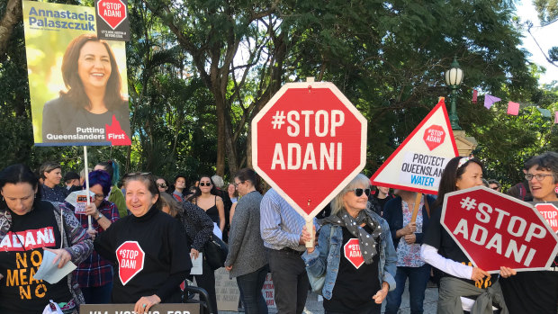 Protesters ask for science to be the key factor in the decision to approve or reject the groundwater management plan for  Adani's Carmichael mine in central Queensland.