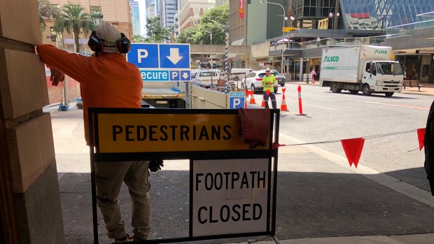 Footpath closed sign on Adelaide Street near Anzac Square.