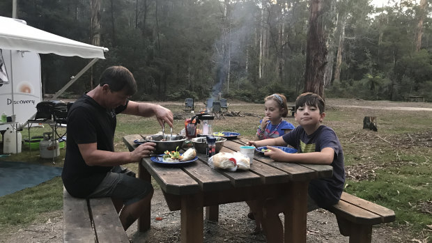 Marcus Andrews with his kids Quinn, 11, and Asha, 6, enjoying the relaxed lifestyle in the Gippsland Lakes region.