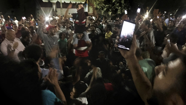 Protesters chant slogans against the regime in Cairo.
