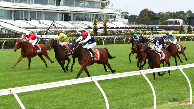 Johnny Get Angry wins the Victoria Derby in front of empty Flemington grandstands.