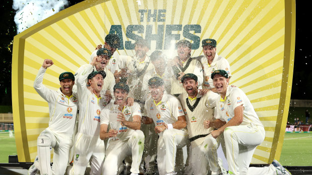 Australia celebrate, without Khawaja. 