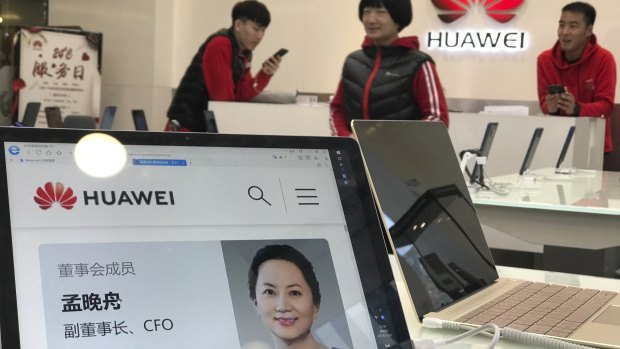 A profile of Huawei's chief financial officer Meng Wanzhou is displayed on a Huawei computer.