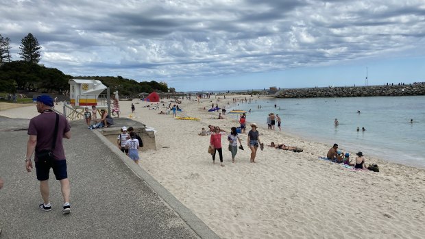 Bathers at Cottesloe Beach on Saturday around lunchtime mostly observing the 1.5m rule.