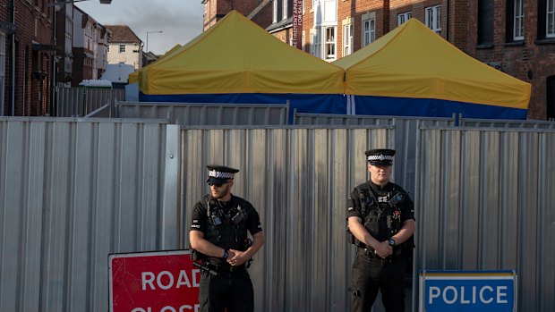 Police secure a point of interest in Salisbury, where counter-terrorism officers are investigating after a woman and her partner were exposed to the nerve agent Novichok. 